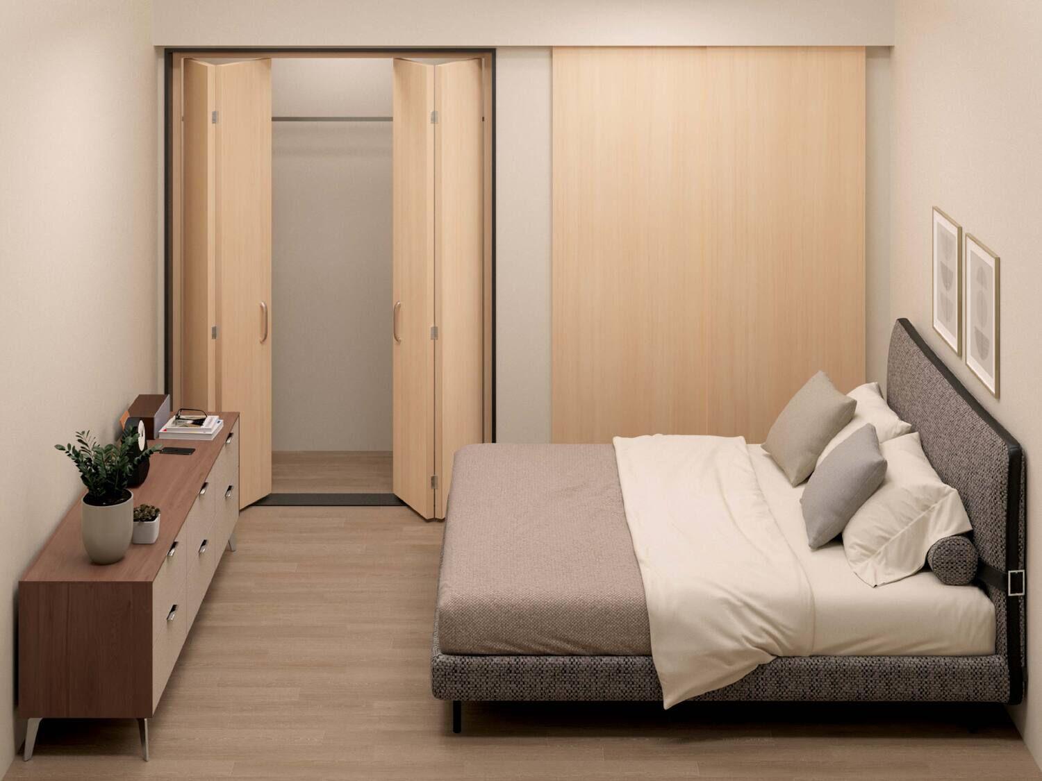 クイーンサイズのベッドを配置した6畳の寝室の全体図